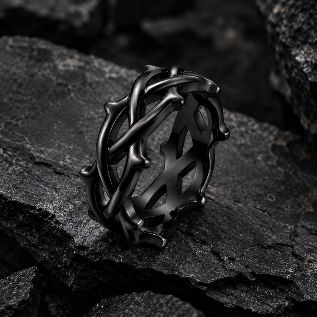 ÞURISAZ thorn ring, black, on stone